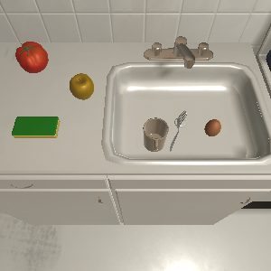 A simulated kitchen sink with a cup and an egg in it